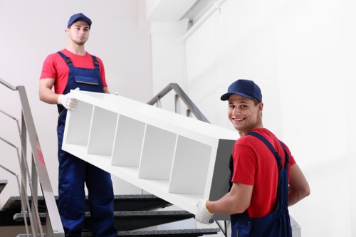 Enfield Man And Van team loading furniture for a local move