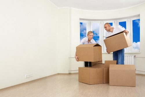 Removal team preparing a move in Enfield on a residential street