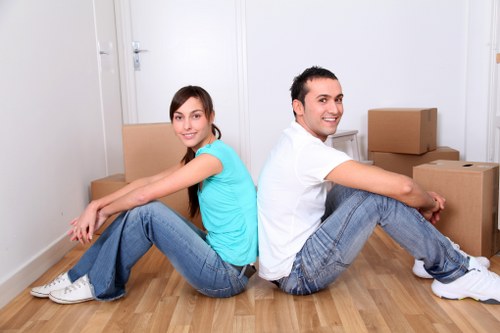 Packing boxes and furniture ready for local removal service