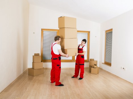 Professional movers handling a property move with local access considerations