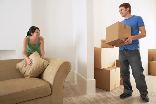 Careful loading of boxes and furniture for a home move in Enfield